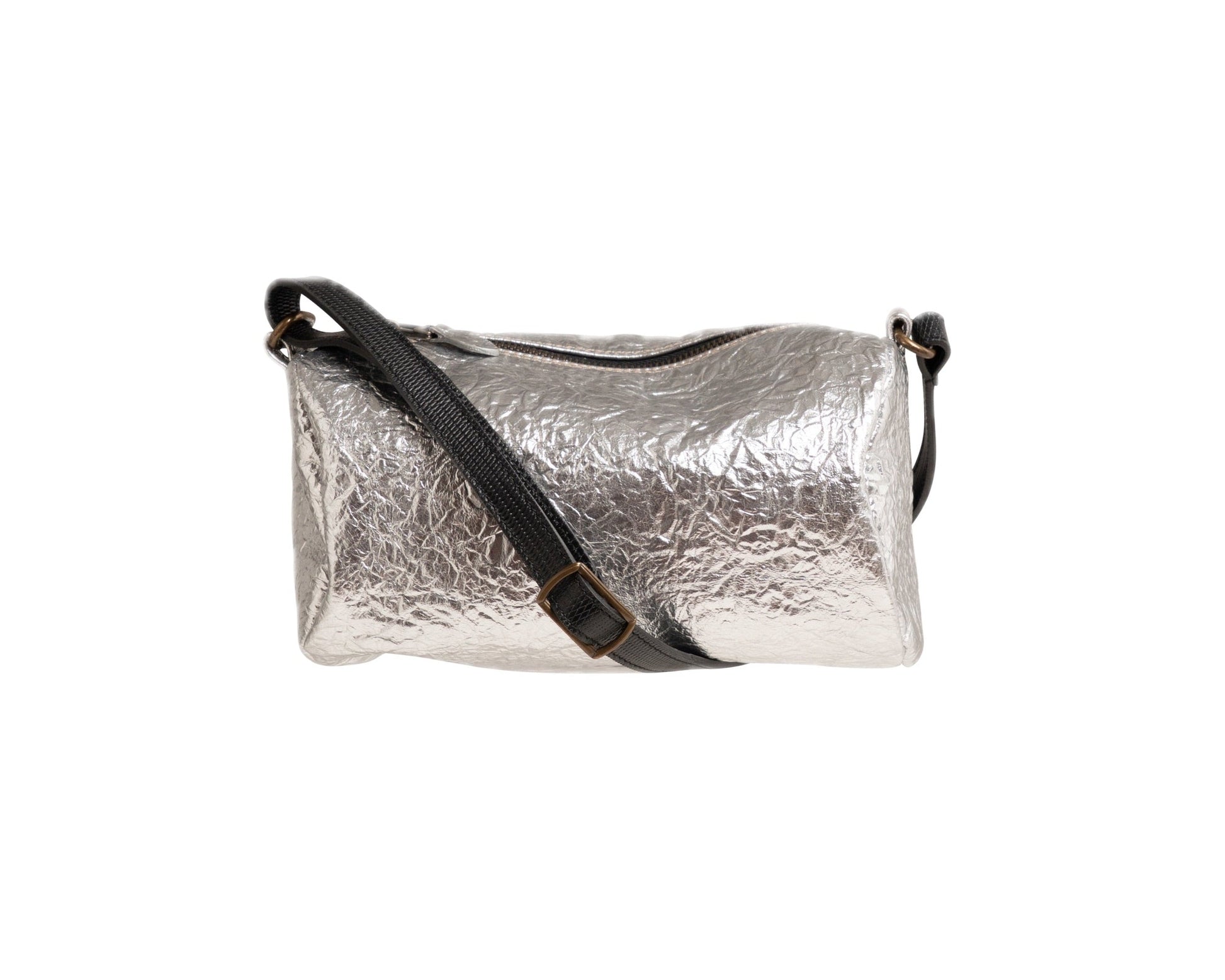Silver metallic clutch bag with a black strap on a white background